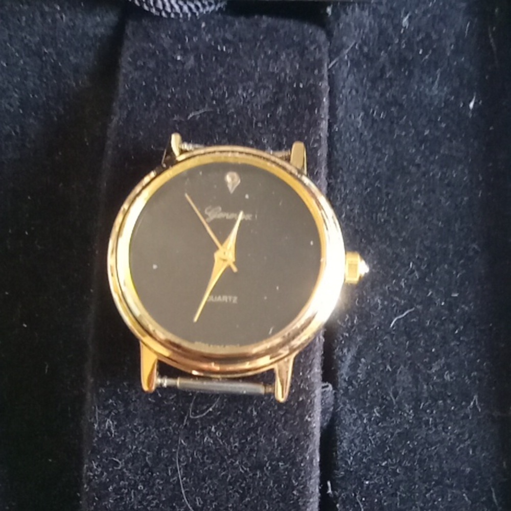 Vintage Womens Genevex quartz strap watch needs strap. Movado like black dial